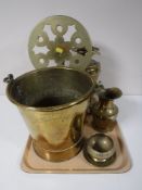 A tray containing a brass bucket and trivet, brass oil lamp, brass jug,