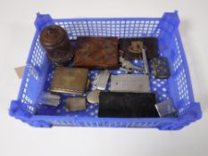 A basket of smoking related items including vesta cases, cigarette cases,