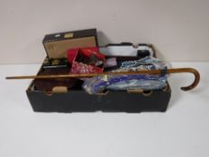 A box containing beaded bag and slippers, jewellery boxes, costume jewellery, walking cane,
