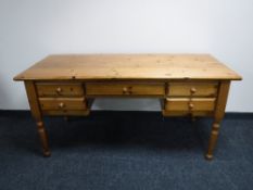 A pine kneehole writing desk,