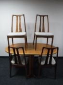 A six piece teak Parker Knoll dining room suite, comprising of display cabinet,