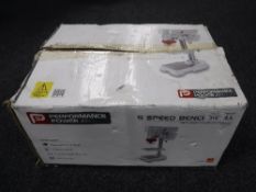 A boxed Performance five speed bench drill