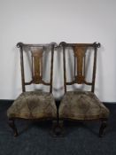 A pair of Victorian inlaid mahogany bedroom chairs