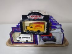 A tray containing thirty boxed diecast vehicles including Oxford Diecast, Vanguards,