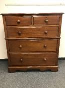 A Victorian mahogany five drawer chest,