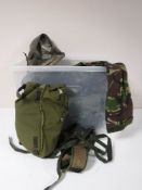 Two boxes containing military uniforms, mats,