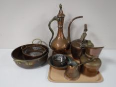 A tray containing an Eastern brass and copper tea pot, antique copper kettle,