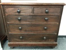 A Victorian pine five drawer chest