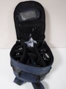 A Samsonite backpack, containing a Practika BX20 camera with lenses and accessories