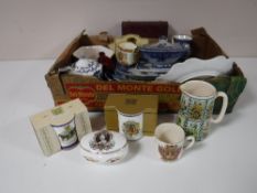 A box containing Ringtons china, boxed Ringtons cars, commemorative ware,