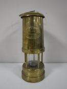 A Hockley Lamp & Limelight Company brass miner's lamp