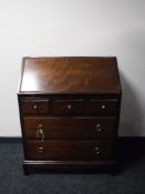 A Stag Minstrel bureau fitted five drawers