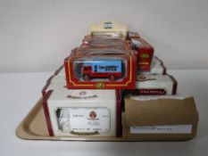 A tray containing thirty boxed diecast vehicles,