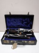 A five piece Boosey and Hawkes clarinet in case with extra parts