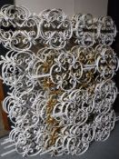 Nineteen wrought iron window grills