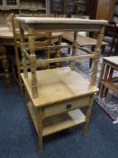 A nest of three 20th century blonde oak tables,
