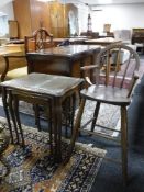 A child's Windsor style high chair and a nest of three tables