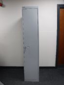 A Bisley single door locker with key