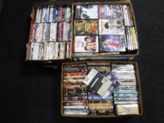 Three boxes containing a large quantity of assorted DVD's