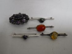 A collection of various silver jewellery including amethyst brooch etc.