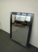 A 120 cm x 180 cm two tone glass mirror.