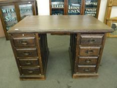 An early 20th century oak roll top desk base
