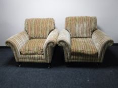 A pair of Parker Knoll armchairs in striped fabric