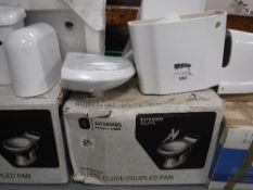A large quantity of bathroom furniture - toilet pans, cisterns, hand basins, pedestals,