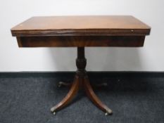 A mahogany pedestal TOT tea table