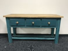 A painted pine kitchen three drawer preparation table