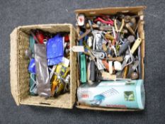 Two boxes containing a large quantity of assorted hand tools, oil can, Bosch Isio hedge trimmer,