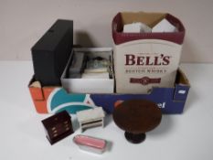 A box containing a large quantity of dolls furniture