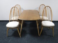 An Ercol elm drop leaf table,