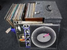 A crate of quantity of LP records including The Beatles, Jethro Tull, Queen,