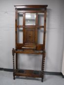 An oak barley twist mirrored hall stand