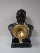 A figure of a jazz musician playing a trumpet