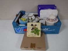 A box of boxed collector's plates, Ringtons plates,