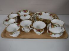 A twenty one piece Royal Albert Old Country Roses tea service with a Royal Albert Celebration of
