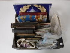 A box containing an Esso FA Cup centenary coin collection , stamp albums, cigarette card albums,
