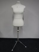 A Singer dress maker's dummy on stand