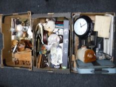 Three boxes containing wooden pieces, shells, vintage hot water bottle,