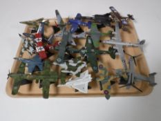 A tray containing twenty die cast airplanes on stands