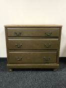 A 20th century painted pine three drawer chest