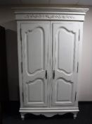 A contemporary double door French style wardrobe CONDITION REPORT: This measures