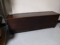 A stained pine blanket chest