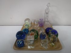 A tray containing assorted glass paperweight, Caithness glass vase, a RCR Art Deco glass figure,