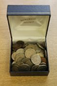 A box of various coins