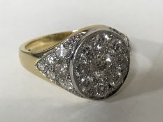 A superb quality 18ct gold diamond set signet ring, the centre stone weighing approximately 0.