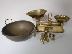 A tray containing a set of Mordue brothers scales and graduated weights,