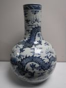 A Chinese blue and white bulbous vase, with dragon decoration,